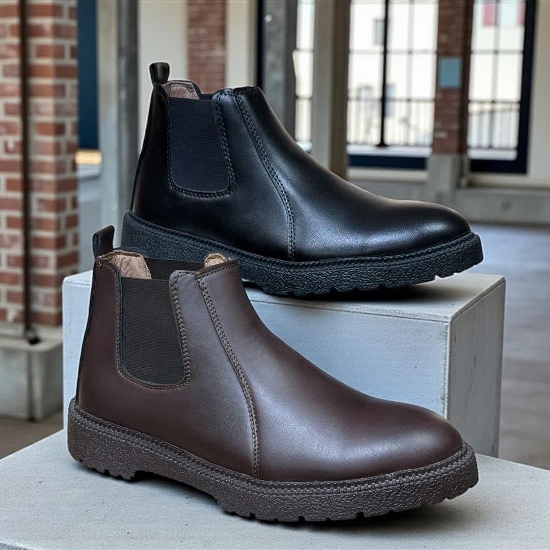 بوت كاحل جلدي بزيم.